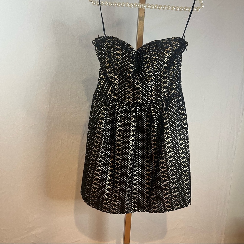 Strapless black and gold dress